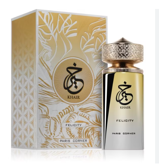 Khair Felicity perfume bottle and its matching box by Paris Corner, featuring gold, white, and silver packaging with Arabic calligraphy details.