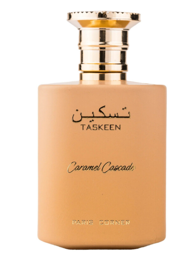 A bottle of TASKEEN Caramel Cascade perfume with a matte peach-beige body and a shiny gold cap, shown on a plain white background.