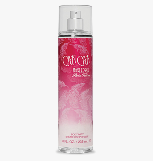 A bottle of Can Can Burlesque Paris Collection body mist, featuring a pink and white tropical leaf pattern on a clear plastic bottle with a white spray cap, set against a plain white background.
