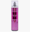 A 5 oz clear spray bottle of PINK RUSH Paris Hilton fragrance with a glittery pink body and a silver pump, shown on a light gray background.