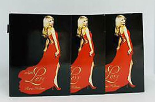 A three-panel folding display or brochure featuring the same blonde woman in a long red gown on a black background, with gold script text that appears to read 'with Love' and 'Amanda Wallen'.