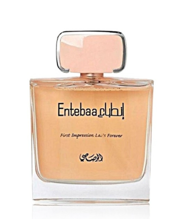 Entebaa by L.A. Forever perfume bottle with a peach-colored liquid and a matching peach cap, shown on a white background.