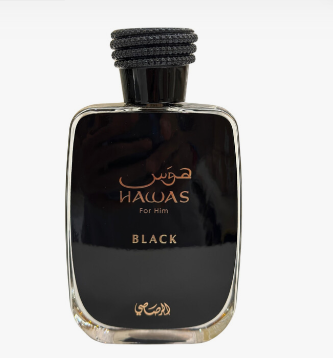 A bottle of Nawas For Him Black perfume, featuring a glossy black glass body with a textured black cap, and gold lettering on the front, set against a plain white background.