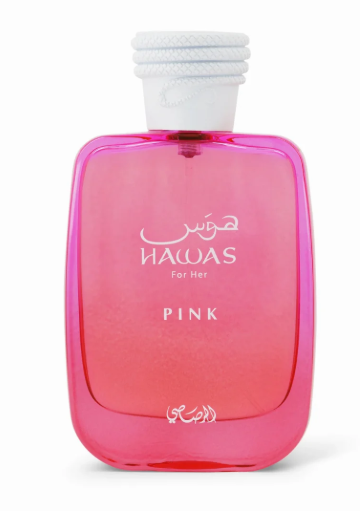 A pink rectangular perfume bottle with rounded corners, featuring a white textured cap. The front of the bottle displays the brand name 'HAWAS' in English and Arabic script, along with the words 'For Her' and 'PINK'.
