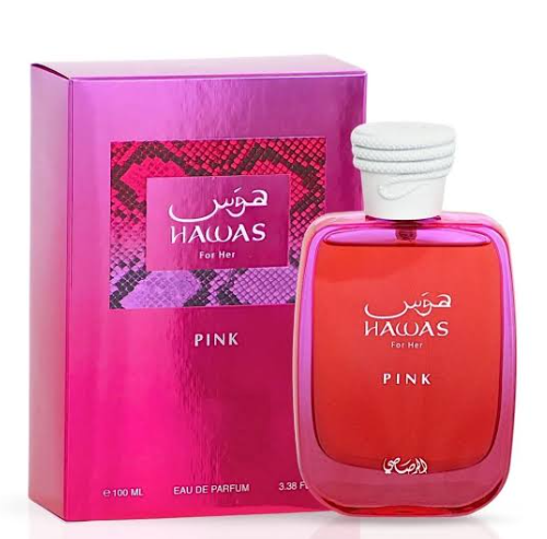 Hawas For Her Pink Eau De Parfum bottle and its matching pink packaging box, featuring a vibrant pink and red gradient design with white Arabic lettering.