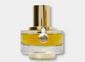 A bottle of Vuitton Vis perfume with golden-yellow liquid in a clear glass bottle, featuring a shiny gold cylindrical cap and a circular gold logo medallion on the front, set against a light gray background.