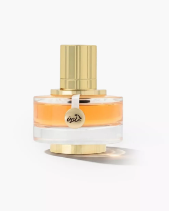 A bottle of Viktor & Rolf Vuitton Oblique Eau de Parfum with amber-colored liquid in a clear glass bottle, featuring a gold cap and base, and a gold hanging tag with the brand name.