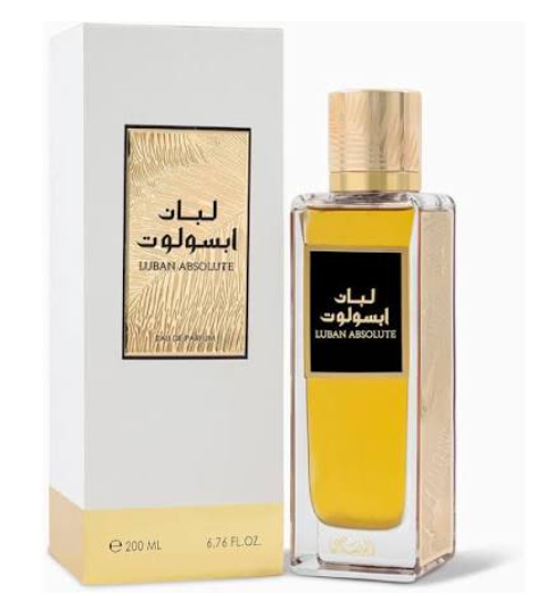 Luban Absolut perfume bottle and its white packaging box, featuring a golden-yellow liquid inside a clear glass bottle with a gold cap and a black label with Arabic text.