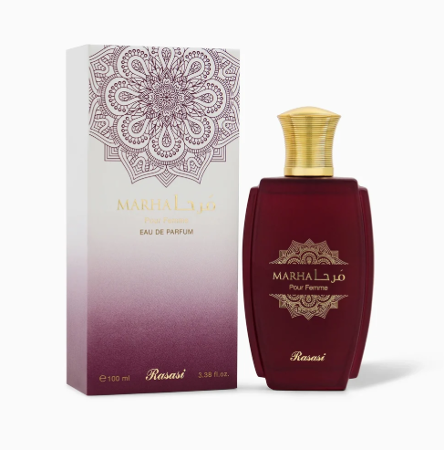 A bottle of Rasasi Marhal Al-Aqsah Eau de Parfum next to its packaging box. The bottle is deep burgundy with a gold cap and gold lettering, while the box features a white-to-purple gradient with a purple mandala pattern at the top.