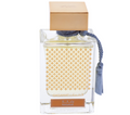 A clear glass perfume bottle with a gold geometric patterned insert, a gold cap, and a blue tassel cord, labeled Rasana by Qasamat for Her.