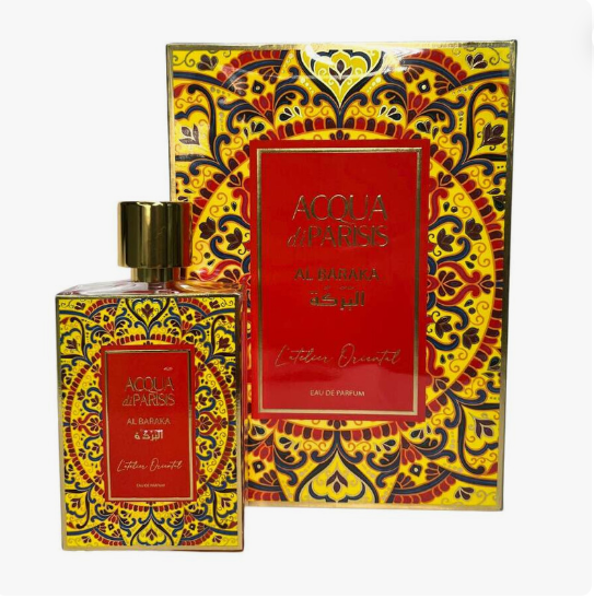 Accqua d'Paris Al Mubarak Eau de Parfum bottle and its matching decorative box, featuring a vibrant yellow, red, and blue patterned design with a gold cap.