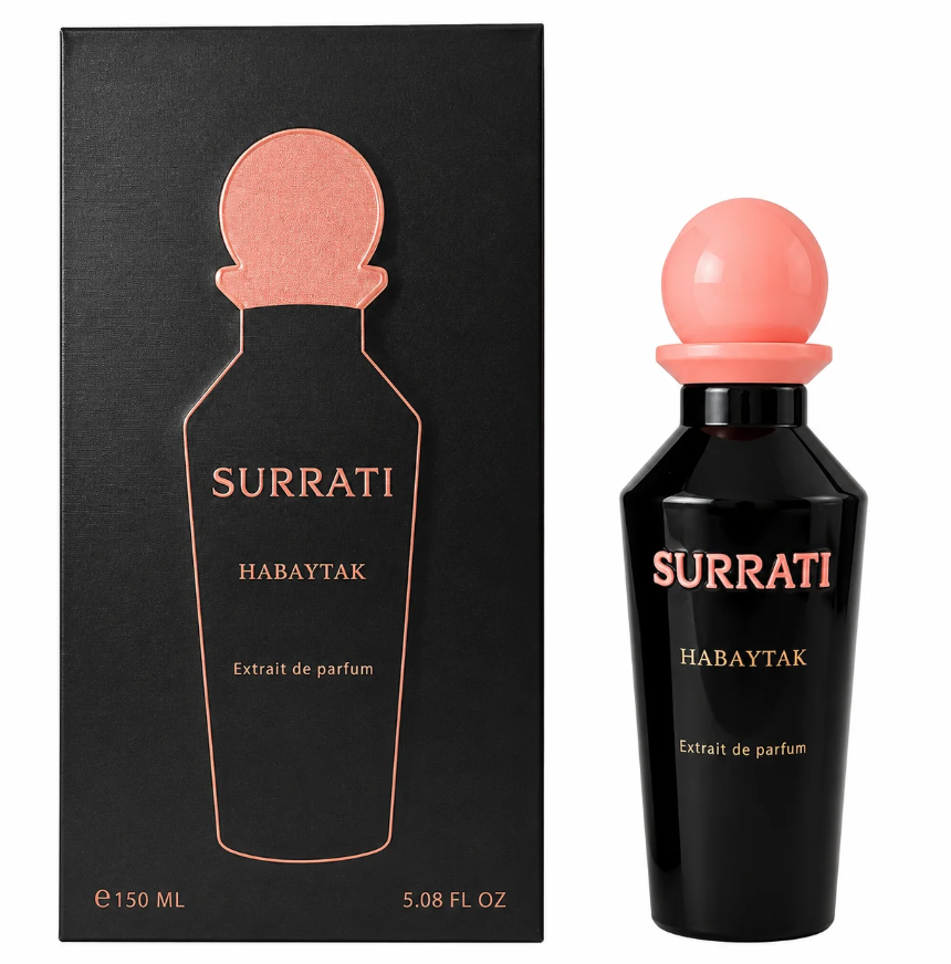 Surrati Habaytak Extrait de Parfum bottle and its black packaging box, featuring a glossy black bottle with a peach-colored spherical cap and matching text, next to its black box with a peach outline of the bottle.