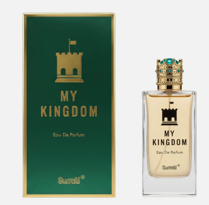 My Kingdom Eau De Parfum bottle with a gold crown cap next to its green and gold box, featuring the Surati brand name.
