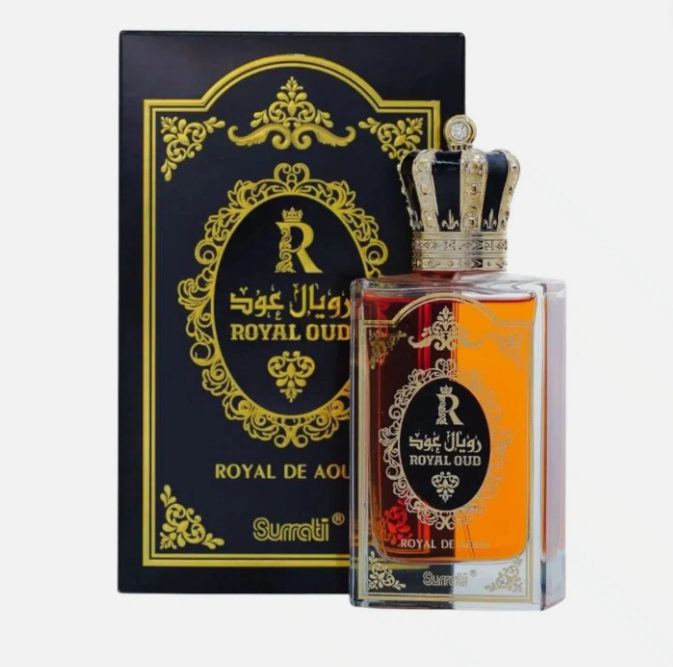 Royal De Oud perfume bottle with a crown cap next to its black and gold outer box, featuring orange and red gradient liquid inside, on a light gray background.