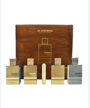 Al Haramain Since 1975 fragrance gift set featuring a wooden presentation box and five bottles of different sizes in gold and silver tones, arranged against a plain white background.