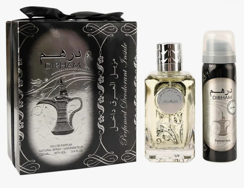 Dirham Perfume gift set featuring a black and silver outer box, a rectangular glass perfume bottle with pale yellow liquid, and a matching black and silver perfume spray can.