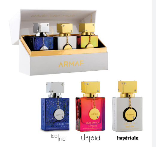 Three ARMAF Club de Nuit essential oils in different colored bottles (blue, pink, and white with gold details) shown both inside their open presentation box and as individual bottles below, labeled 'iconic', 'Urtold', and 'Impérial'.