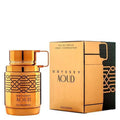 Gold Odyssey Aoud perfume bottle and packaging on a white background