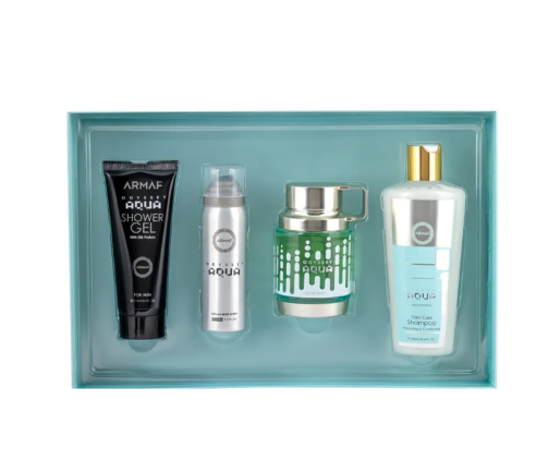 A 4-piece men's shower gift set from Armaf and Noua, neatly arranged inside a light teal-blue rectangular tray. The set includes a black Armaf Armaqua Shower Gel tube, a silver Noua shower gel bottle, a green and silver Noua perfume bottle, and a white Noua shower foam bottle with a gold cap.