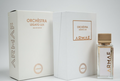 Armae Orchestra Legato Lux Eau de Parfum shown with its white outer packaging box, inner box, and a clear glass bottle with a gold cap on a light gray background.