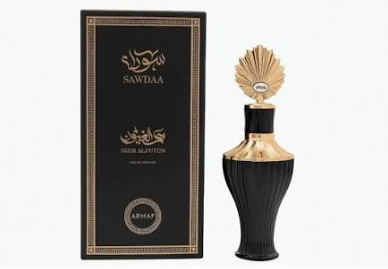 Sawdaa Al-Ahlia perfume bottle and its black packaging box with gold lettering, set against a plain white background.