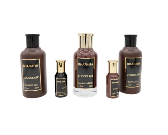 Four Bharara Chocolate toiletry bottles on a plain white background, including shower gel, body lotion, and eau de parfum, in dark brown and black packaging with gold lettering and caps.
