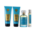 Lalique By Stallion 53 fragrance gift set featuring a shower gel tube, facial cleanser tube, a 300ml perfume bottle, and a travel spray rollerball, all in blue and gold packaging on a white background.