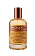 A 100 ml bottle of Mangofizz Eau De Parfum by Stalder, featuring a warm amber liquid, a brown label with gold lettering, and a metallic copper cap, set against a plain white background.