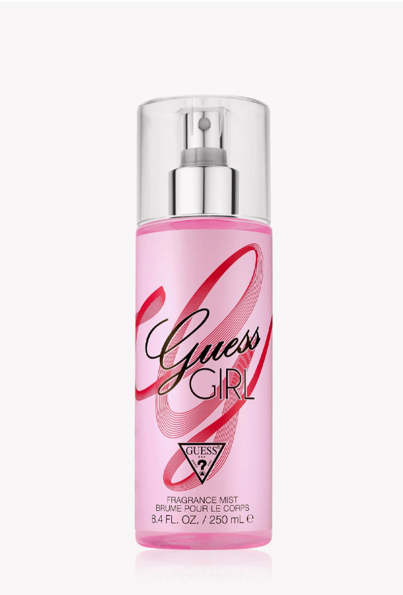 Guess Girl Fragrance Mist in a pink spray bottle with a clear cap and silver pump, on a light gray background.