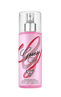 Guess Girl Fragrance Mist in a pink spray bottle with a clear cap and silver pump, featuring the Guess logo on the front.