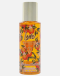 Guess Sunkissed Flirtation perfume spray bottle with a gold cap, featuring a vibrant orange and yellow label with illustrations of oranges and the word 'Love'.
