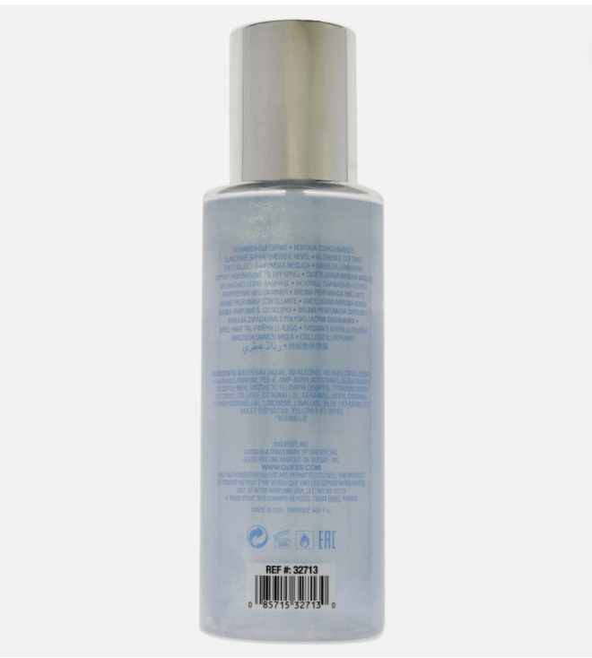 The back of a translucent light blue bottle with a metallic silver cap, showing blue text and a barcode on a light gray background.