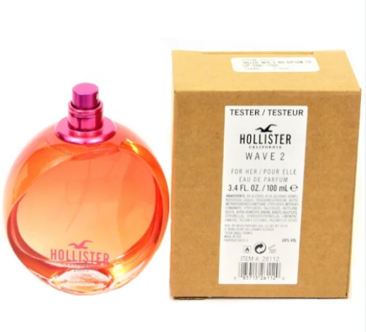 Hollister Wave 2 Eau de Parfum tester bottle in orange with a pink cap, shown next to its brown cardboard box on a white background.