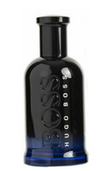 Hugo Boss Boss cologne bottle in a glossy black glass with a blue gradient at the base, featuring embossed 'BOSS' lettering and vertical 'HUGO BOSS' branding on a white background.
