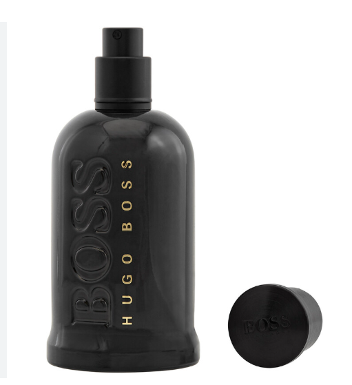 A black Hugo Boss perfume bottle with gold lettering, shown next to its matching black cap on a plain white background.