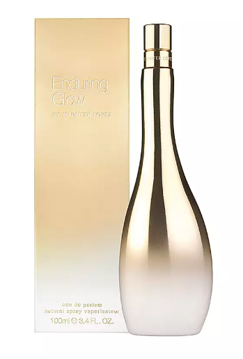 Jennifer Lopez Enduring Glow Eau de Parfum bottle in a metallic gold finish next to its matching gold and white box.
