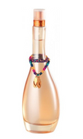 A clear glass perfume bottle filled with pale peach-colored liquid, featuring a colorful braided cord necklace detail with a gold-tone pendant on the front, and a metallic gold neck band. The bottle is centered against a plain white background.