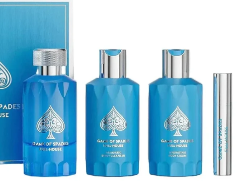 A Game of Thrones 'Full House' body care set featuring three blue bottles with silver caps and a matching blue box, alongside a slim silver tube, on a white background.