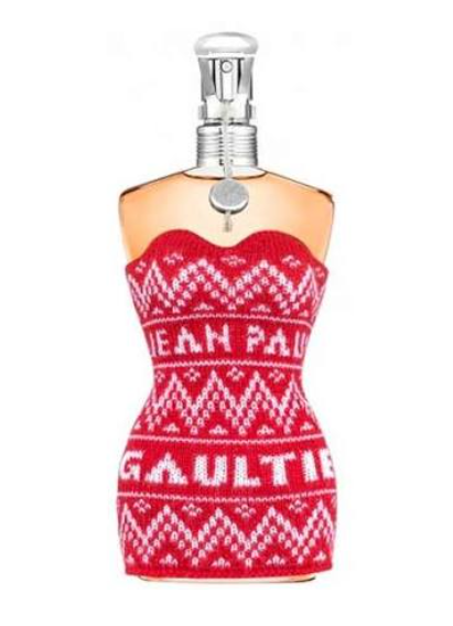 Jean Paul Gaultier perfume bottle styled as a strapless red and white knit sweater dress with the brand name 'JEAN PAUL GAULTIER' printed in white across the front, topped with a silver atomizer cap.