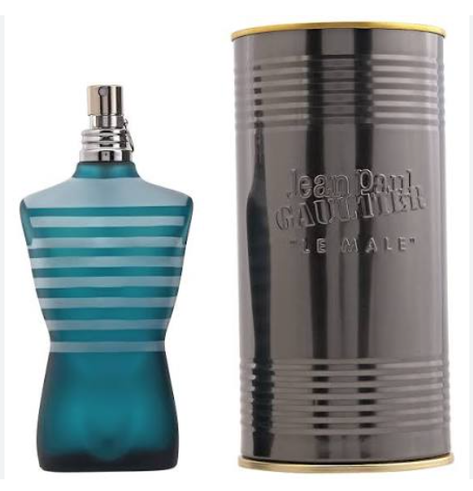 Jean Paul Gaultier Le Male fragrance bottle in a translucent teal-blue glass with horizontal silver stripes, shown next to its dark metallic cylindrical packaging can with gold trim on a white background.