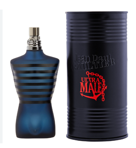 Jean Paul Gaultier Ultra Male cologne bottle in blue with black horizontal stripes next to its black cylindrical packaging canister featuring red and silver branding.