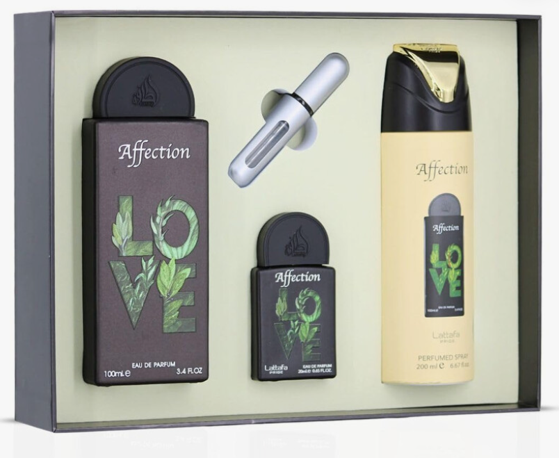 A boxed fragrance gift set on a light background. The set includes a tall dark brown perfume bottle labeled 'Affection LOVE', a smaller matching bottle, a silver atomizer, and a pale yellow perfume spray bottle with a black cap and gold accent, all arranged inside an open presentation box.
