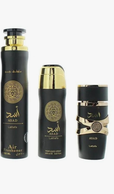 Three black perfume and air freshener bottles with gold caps and gold detailing, including ASAD Air Freshener, Air Freshener, and Parfum, on a white background.