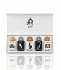 A white Lattafa gift box containing five small perfume bottles with illustrated labels, shown on a clean white background with a reflection below.