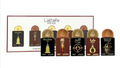 A Lattafa Pride gift set containing eight different Arabic perfume bottles with gold and brown caps, displayed in front of their white and red packaging box.