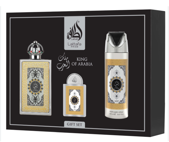 Lattafa King of Arabia gift set containing a perfume bottle, a smaller matching bottle, and a reed diffuser spray, all in ornate gold and silver packaging inside a black box.