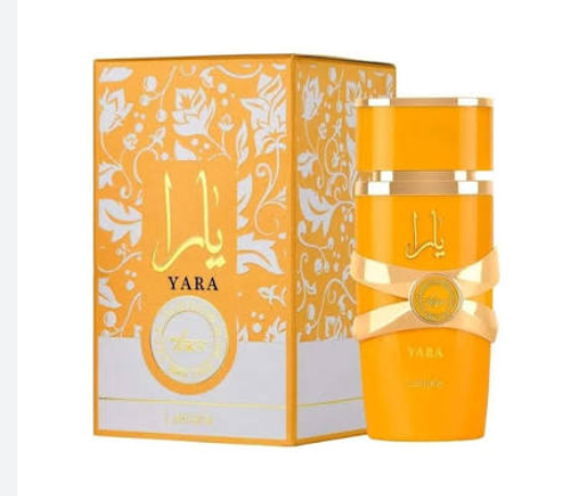 Yara perfume bottle and matching box in a vibrant orange and gold color scheme, featuring Arabic calligraphy and floral patterns on a white background.