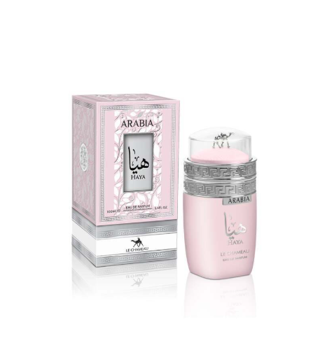 Pink Arabia Maya perfume bottle with a silver patterned band and a matching pink box, shown on a white reflective background.