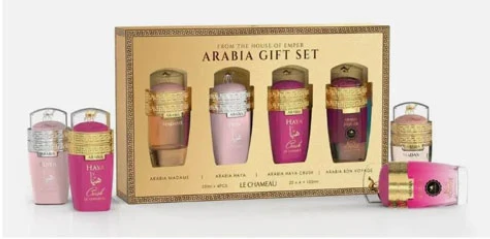 Le Chiffre 'From the House of Enver Arabia Gift Set' featuring four perfume bottles displayed in front of their gold and brown gift box on a white background.