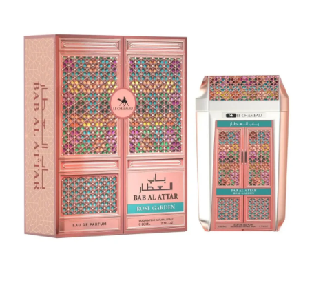 Bab Al Attar Arabian Garden Eau de Parfum shown with its outer box and a smaller bottle, both featuring a pink rose-gold cabinet design with multicolored geometric patterns and Arabic text on a white background.